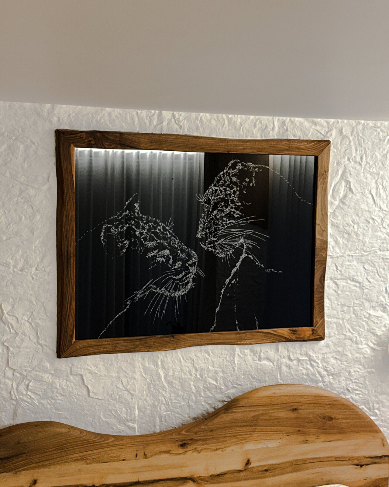 Commissioned leopards in glass, framed in walnut